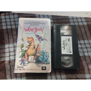 We're Back! A Dinosaur's Story (VHS, 1993, Clamshell)